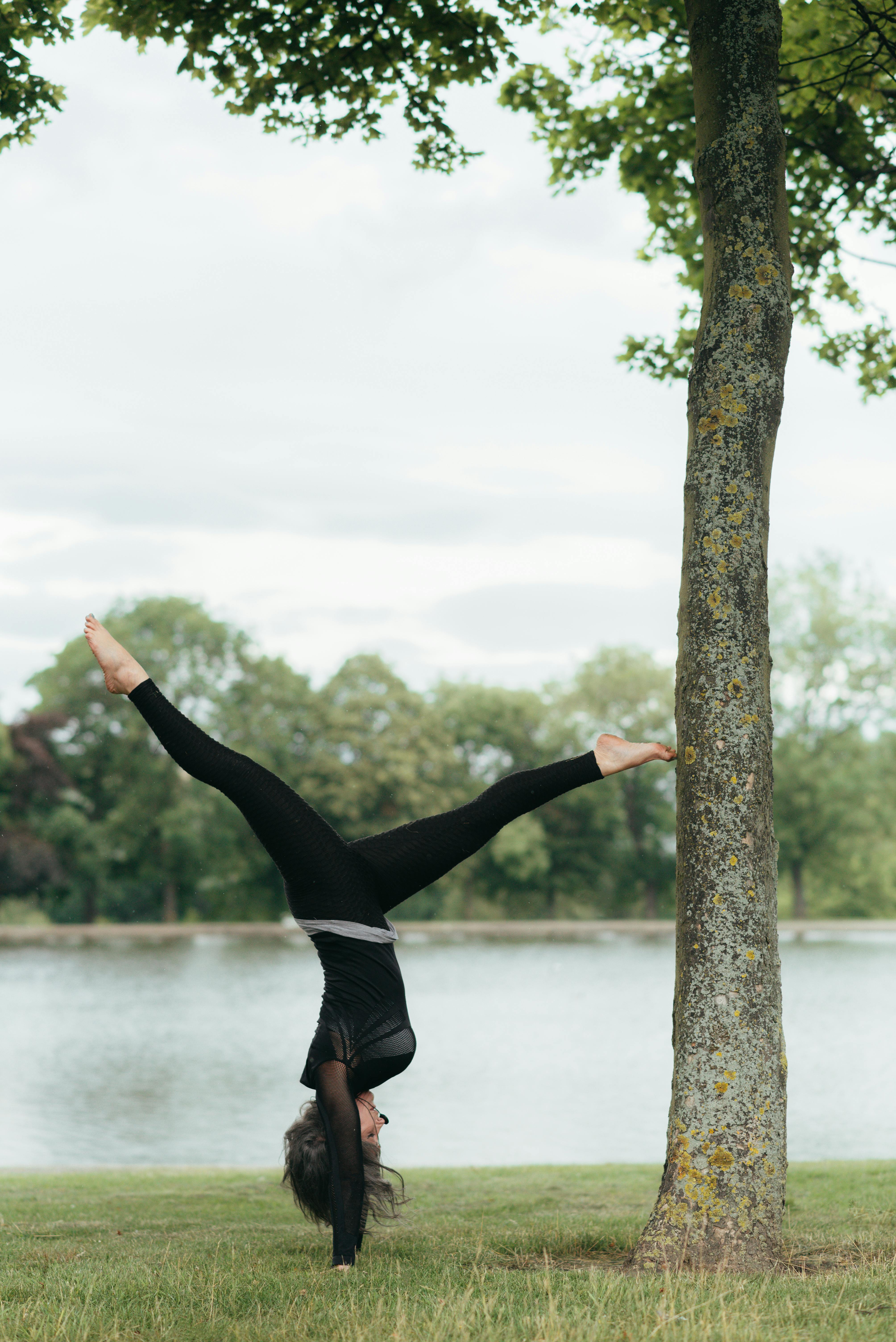 person doing yoga in nature