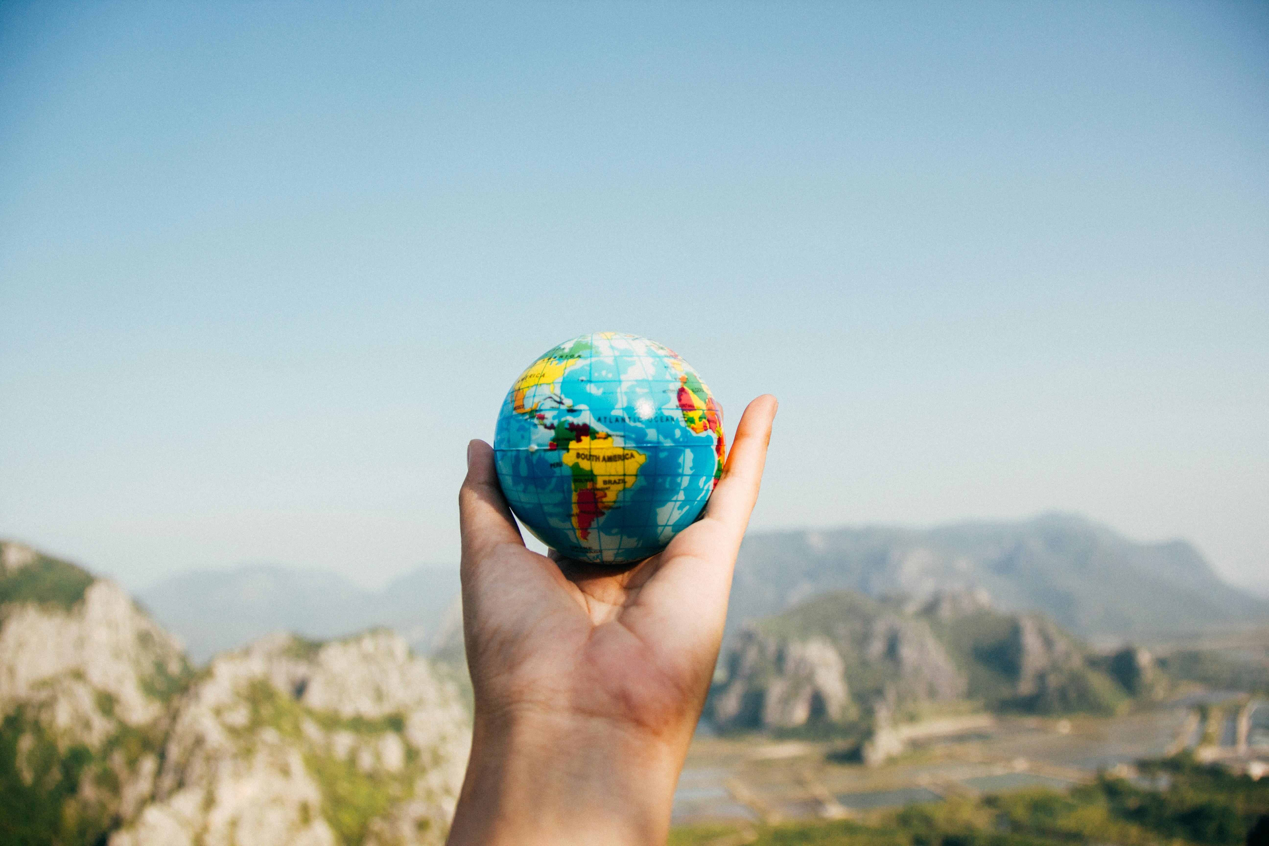 tiny globe in hand